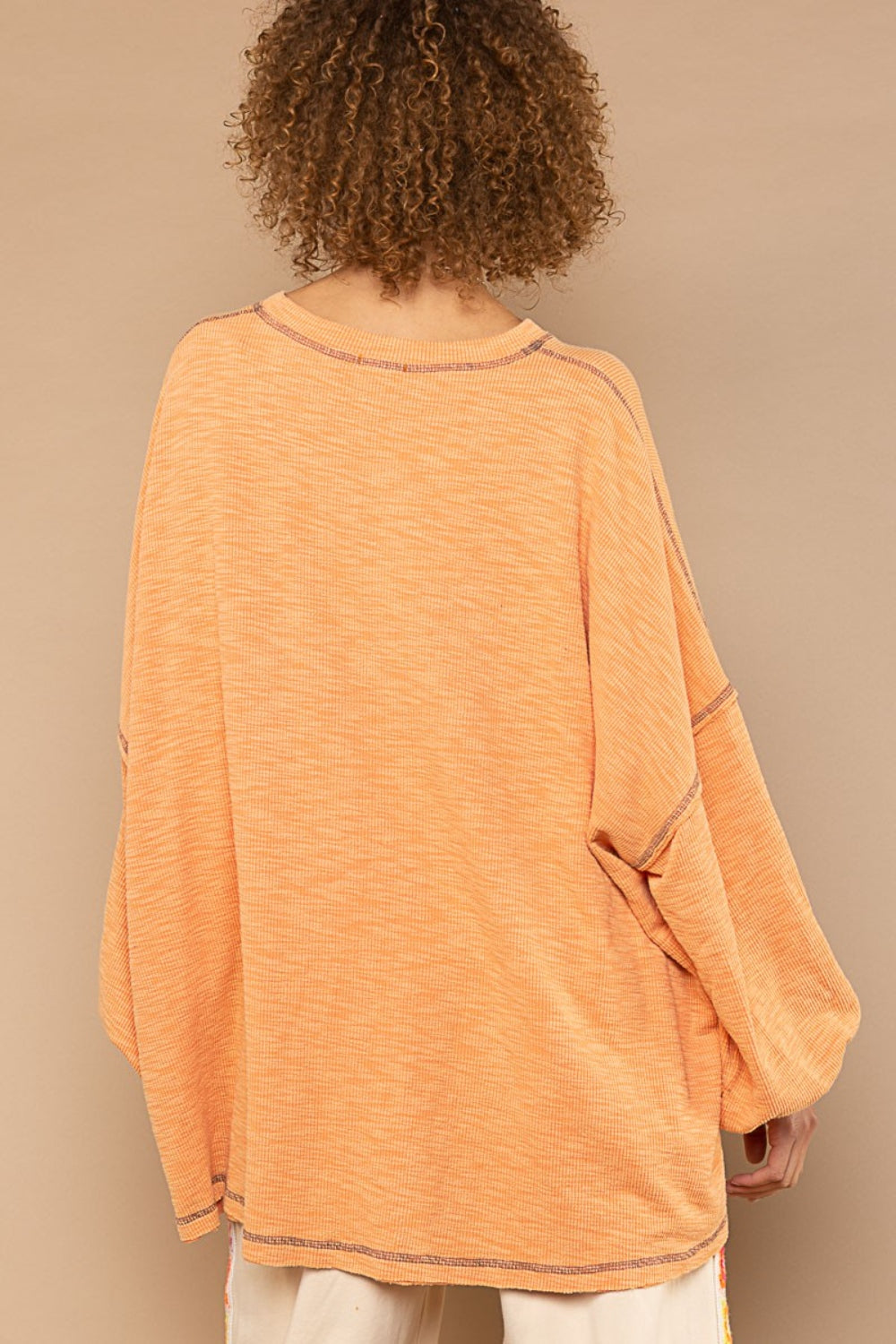 POL Creamsicle Orange Exposed Seam Round Neck Long Sleeve Top